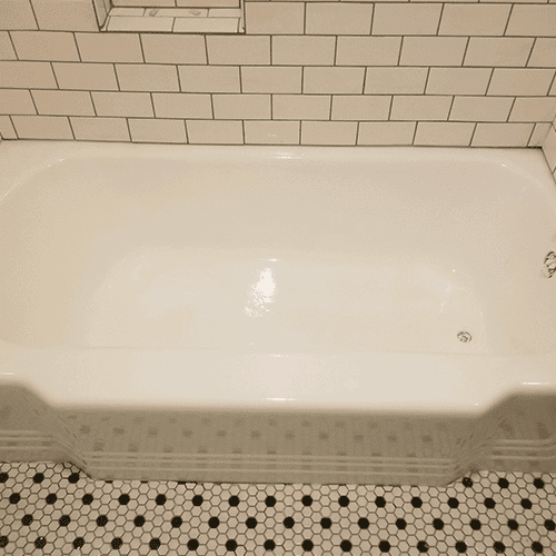 A White Reglazed Bathtub By Renov8