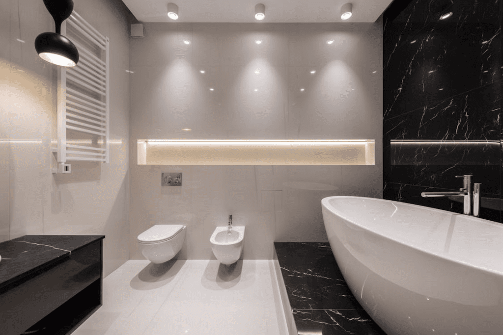 A Modern Bathroom Interior With Tiled Walls.